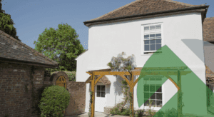 UK home with freshly rendered external wall insulation, highlighting smooth finish and energy-efficient upgrades under the Warm Homes Plan.